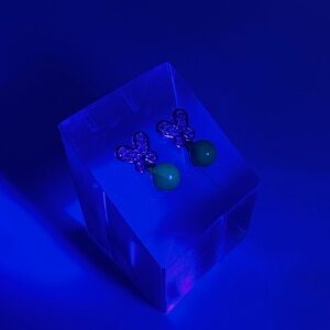 Whimsical Butterfly Earrings with Ethereal Blue Amber Glow – Silver Stud Dangle